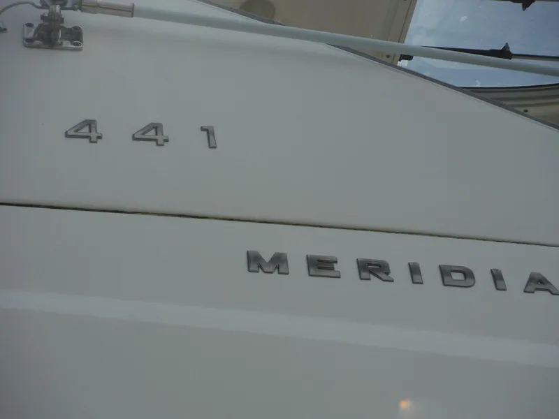 Slide: The Image of 2014 Meridian 441 Sedan yacht exterior branding. - 27