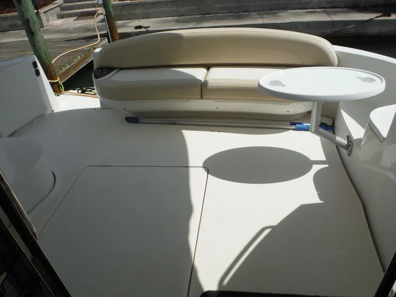 Slide: The Image of 2014 Meridian 441 Sedan boat deck with seating and table. - 4