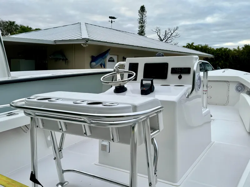 Slide: The Image of 2024 Rambo 22 Center Console boat with modern helm and seating. - 14