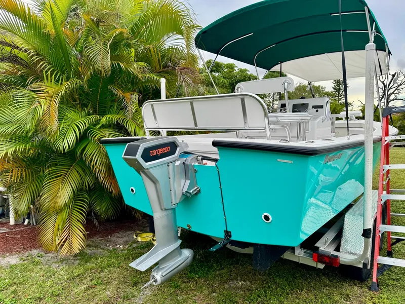 Slide: The Image of 2024 Rambo 22 Center Console boat with Torqeedo motor on trailer. - 26