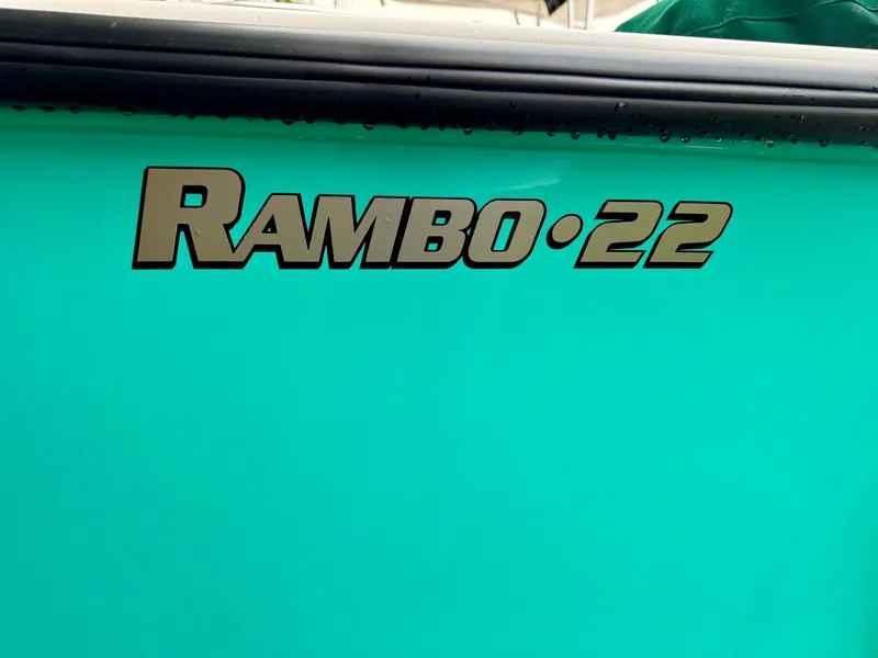 Slide: The Image of 2024 Rambo 22 Center Console boat side view with logo. - 28