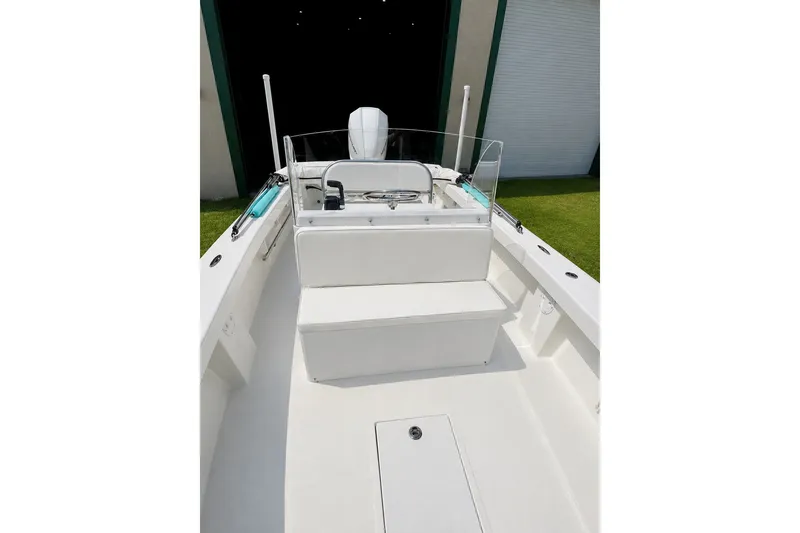 Slide: The Image of 2026 Rambo 22 Center Console boat interior with seating and console view. - 15