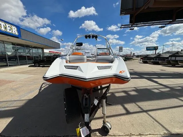 Slide: The Image of 2008 Tigé RZR 24 boat on trailer at dealership, front view. - 3