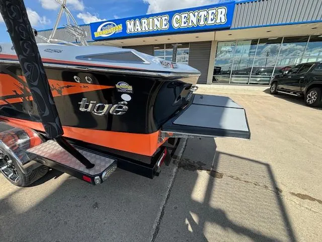 Slide: The Image of 2008 Tigé RZR 24 boat at Marine Center dealership. - 5