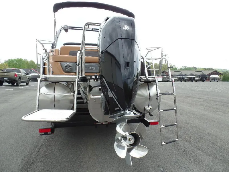 Slide: The Image of 2024 Harris Solstice 250 pontoon boat rear view with powerful outboard motor. - 2