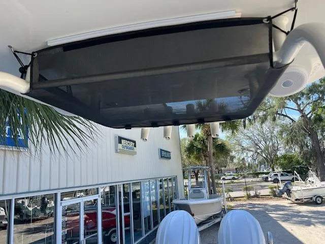 Slide: The Image of 2024 Key West 244 Center Console boat at dealership, exterior view. - 10
