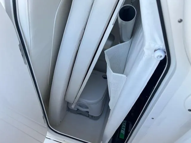 Slide: The Image of 2024 Key West 244 Center Console boat interior storage compartment. - 13