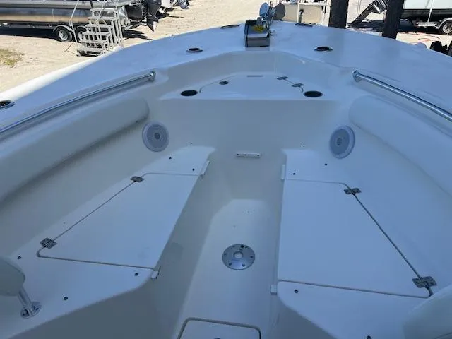 Slide: The Image of 2024 Key West 244 Center Console boat interior, spacious seating and storage. - 17