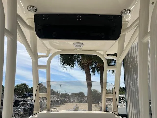Slide: The Image of 2024 Key West 244 Center Console boat with T-top and clear windshield. - 3