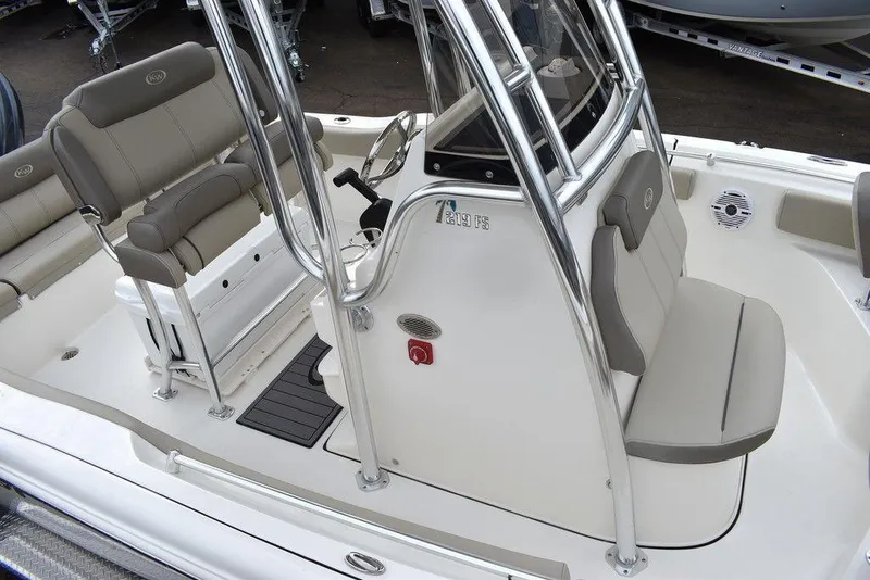 Slide: The Image of 2024 Key West 219 FS boat interior with seating and console. - 12