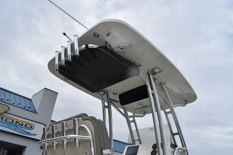 Slide: The Image of 2024 Key West 219 FS boat with T-top and rod holders. - 13