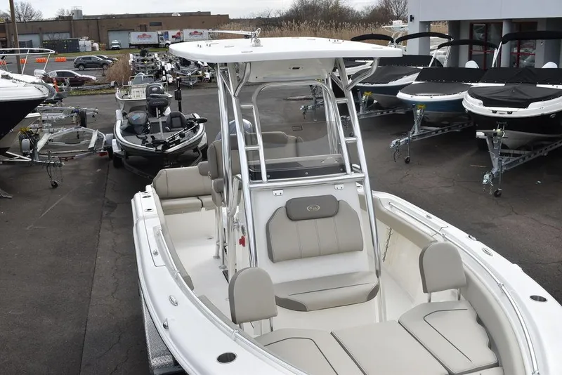 Slide: The Image of 2024 Key West 219 FS boat on display at a dealership. - 15
