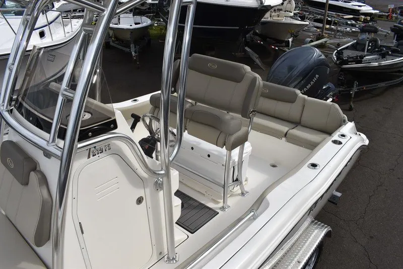 Slide: The Image of 2024 Key West 219 FS boat interior with seating and console. - 17