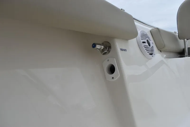 Slide: The Image of 2024 Key West 219 FS boat interior detail showing speaker and fittings. - 34