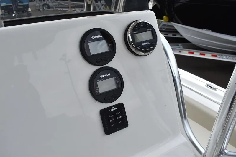 Slide: The Image of Close-up of the 2024 Key West 219 FS boat dashboard with Yamaha gauges. - 39