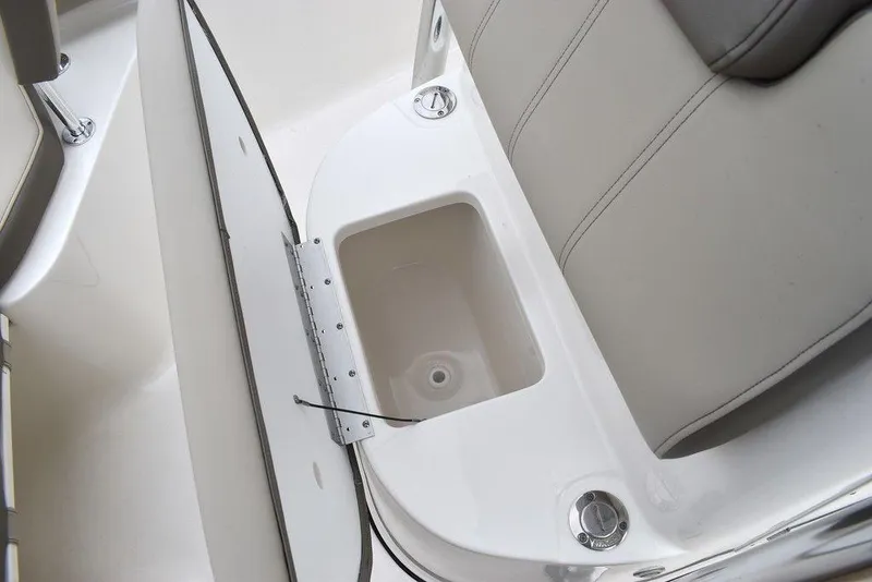 Slide: The Image of 2024 Key West 219 FS boat seat with integrated storage compartment. - 45