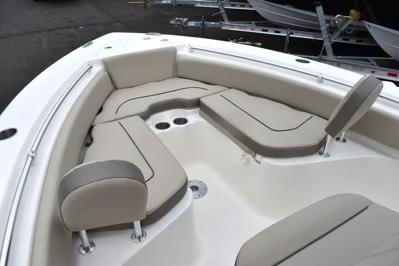 Slide: The Image of 2024 Key West 219 FS boat with spacious seating and cup holders. - 47