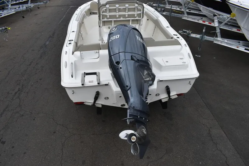Slide: The Image of 2024 Key West 219 FS boat with Yamaha outboard motor, rear view. - 5