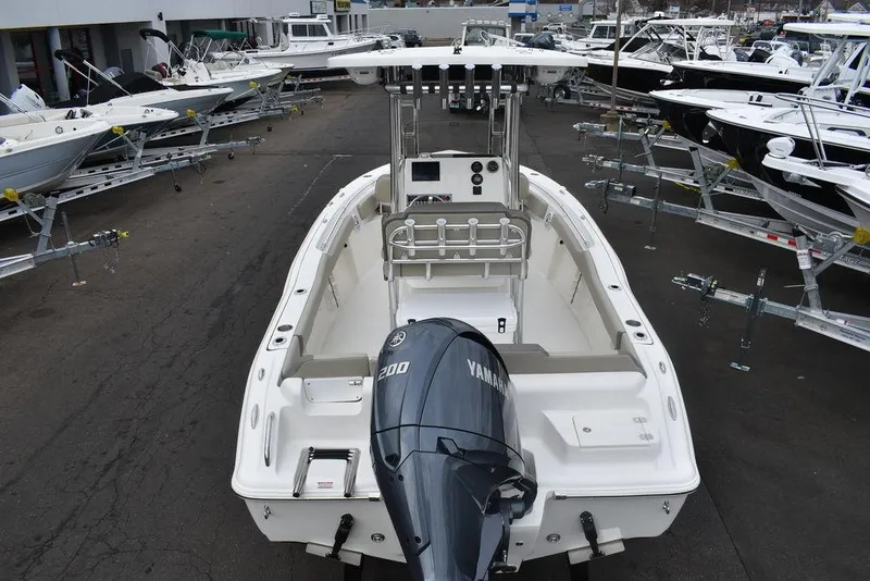 Slide: The Image of 2024 Key West 219 FS boat with Yamaha engine in a dealership lot. - 6