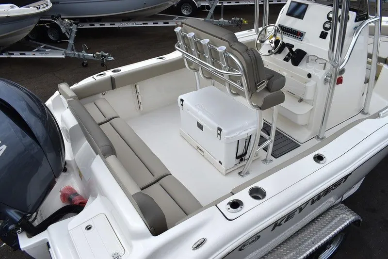 Slide: The Image of 2024 Key West 219 FS boat interior with seating and console. - 8