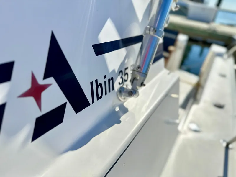 Slide: The Image of Close-up of 2004 Albin 35 Command Bridge boat logo and hardware. - 20