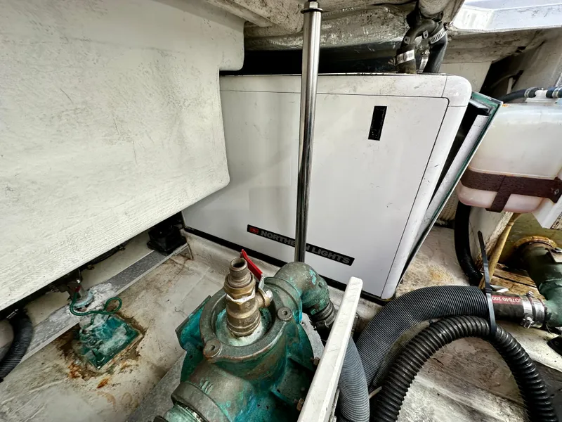 Slide: The Image of Engine compartment of 2004 Albin 35 Command Bridge with Northern Lights generator. - 22
