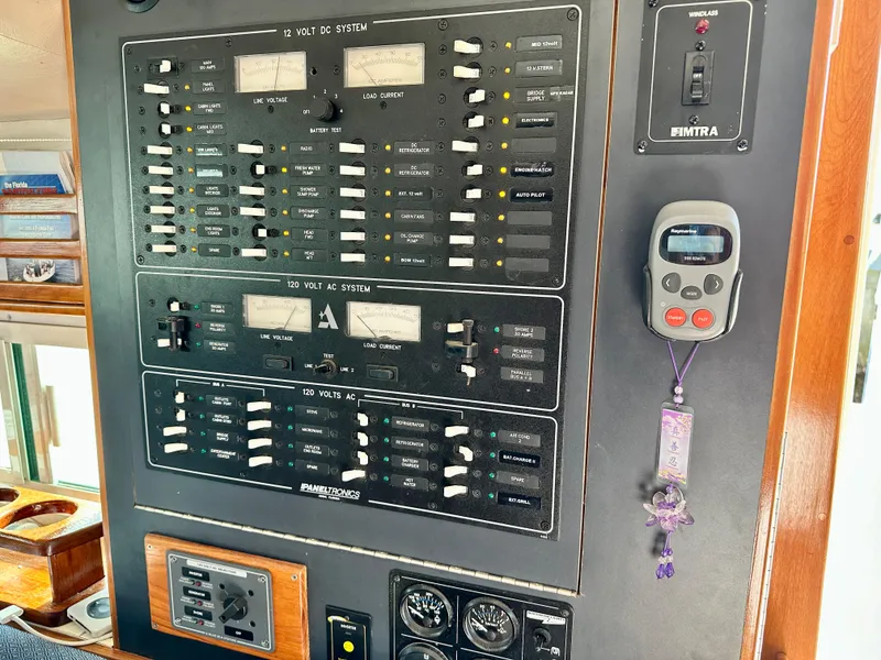 Slide: The Image of Electrical control panel on a 2004 Albin 35 Command Bridge boat. - 34
