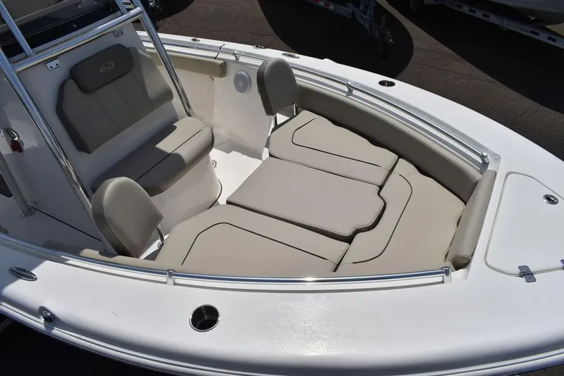 Slide: The Image of 2024 Key West 219 FS boat with spacious seating and cushioned bow area. - 19