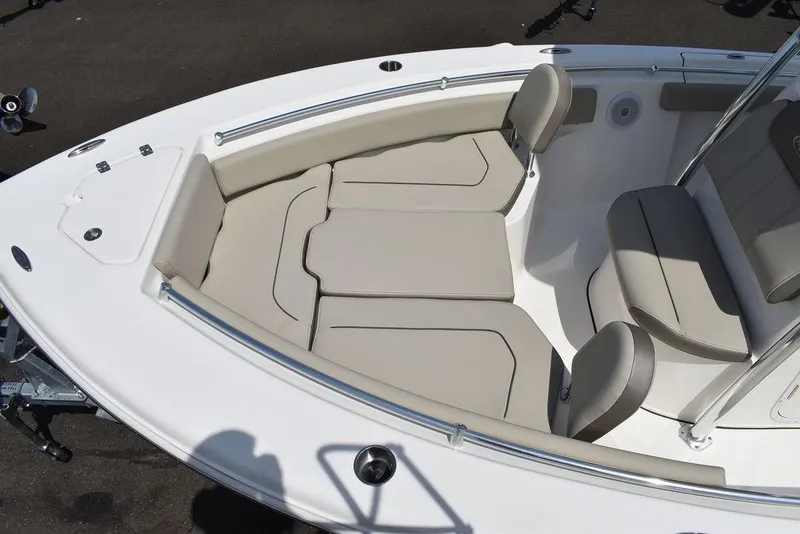 Slide: The Image of 2024 Key West 219 FS boat with cushioned seating area. - 20