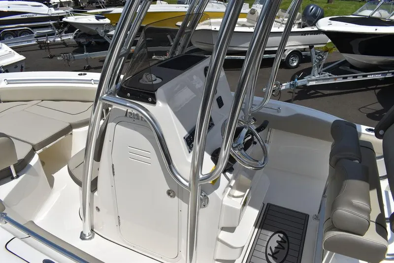 Slide: The Image of 2024 Key West 219 FS boat interior with console and seating. - 26