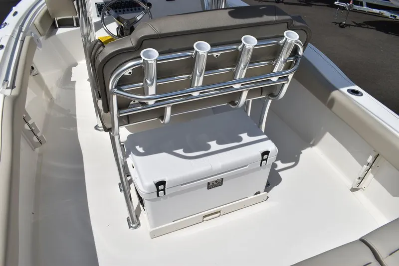 Slide: The Image of 2024 Key West 219 FS boat interior with rod holders and cooler. - 28