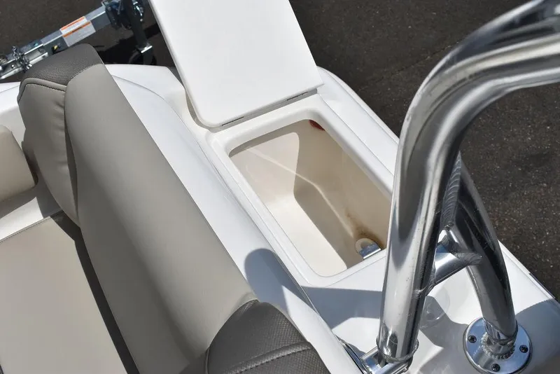 Slide: The Image of 2024 Key West 219 FS boat seat and storage compartment. - 32