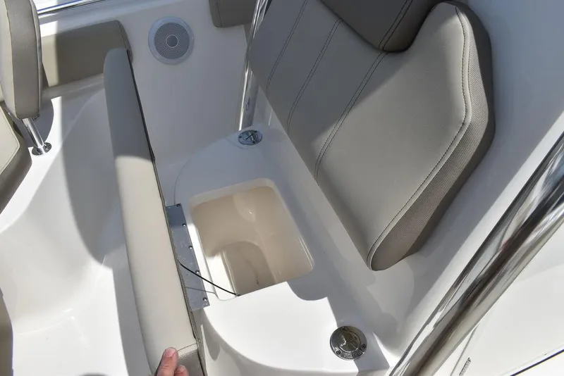 Slide: The Image of 2024 Key West 219 FS boat seat with storage compartment. - 47