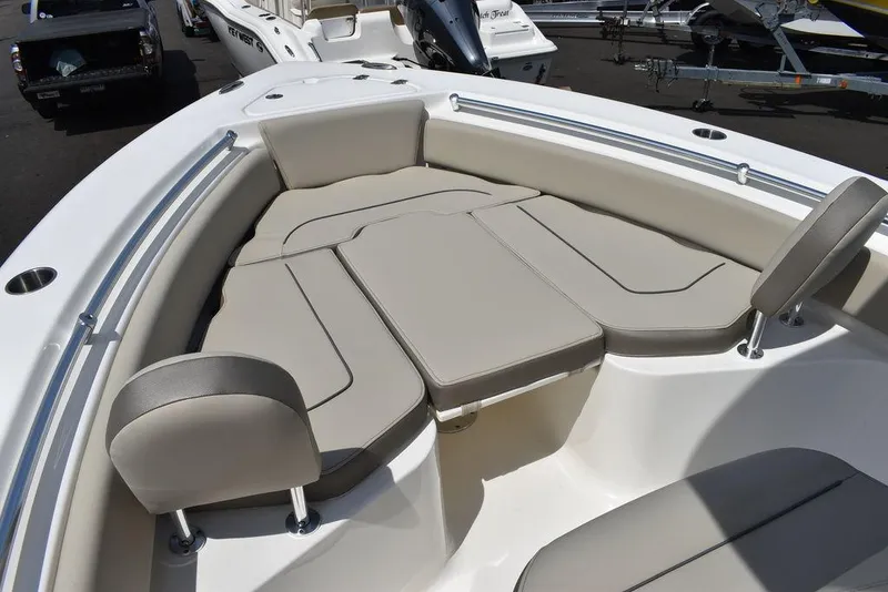 Slide: The Image of 2024 Key West 219 FS boat with cushioned seating area. - 48