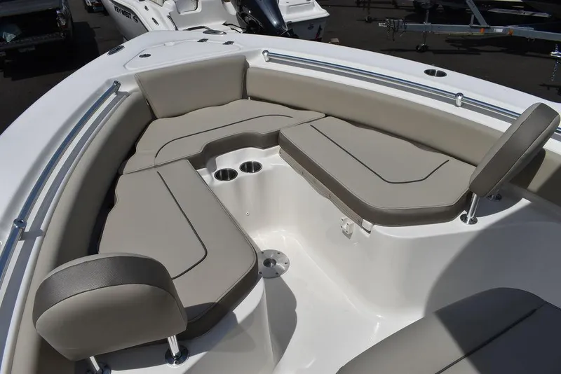 Slide: The Image of 2024 Key West 219 FS boat with spacious seating and cup holders. - 49