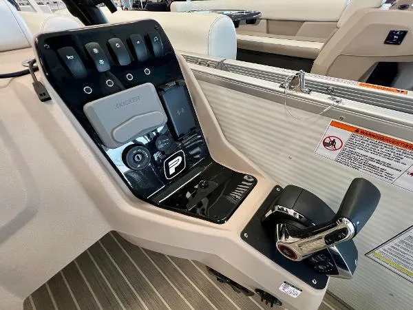 The Image of 2024 Princecraft Vectra 23 RL pontoon boat in a warehouse setting. - 2