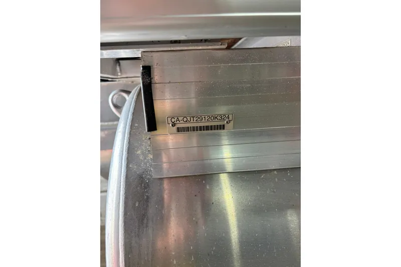 Slide: The Image of 2024 Princecraft Vectra 23 RL boat identification plate with serial number. - 21