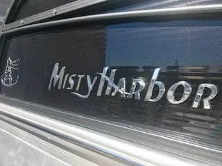Slide: The Image of Misty Harbor SL-2685 2017 boat logo in chrome. - 1