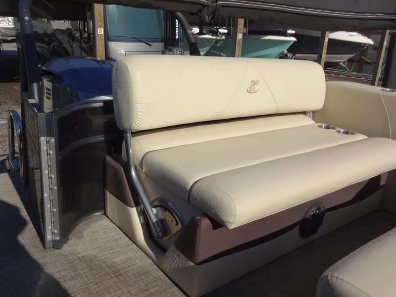 Slide: The Image of 2017 Misty Harbor SL-2685 boat with beige seating and cup holders. - 16