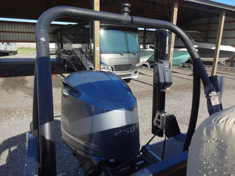Slide: The Image of 2017 Misty Harbor SL-2685 pontoon boat with Yamaha 250 outboard motor in storage. - 20