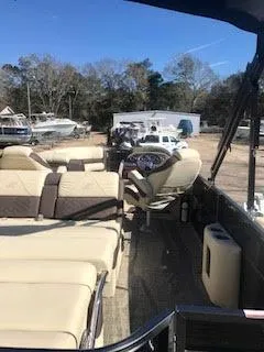 Slide: The Image of 2017 Misty Harbor SL-2685 pontoon boat with beige seating and steering console. - 27