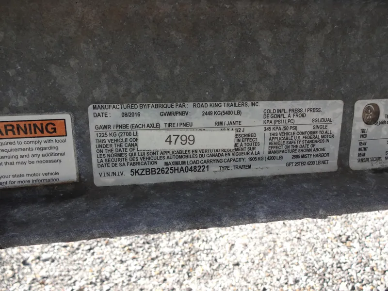 Slide: The Image of 2017 Misty Harbor SL-2685 trailer VIN label and warning sticker. - 35