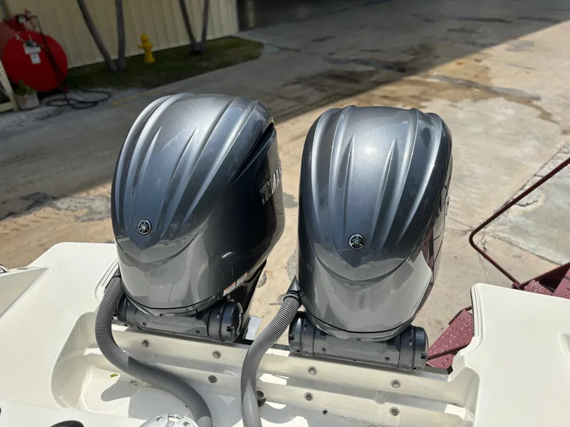 Slide: The Image of 2022 Pursuit S 288 boat with dual outboard engines. - 19