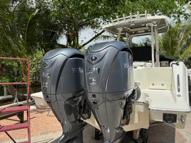 Slide: The Image of 2022 Pursuit S 288 boat with twin Yamaha outboard engines. - 7