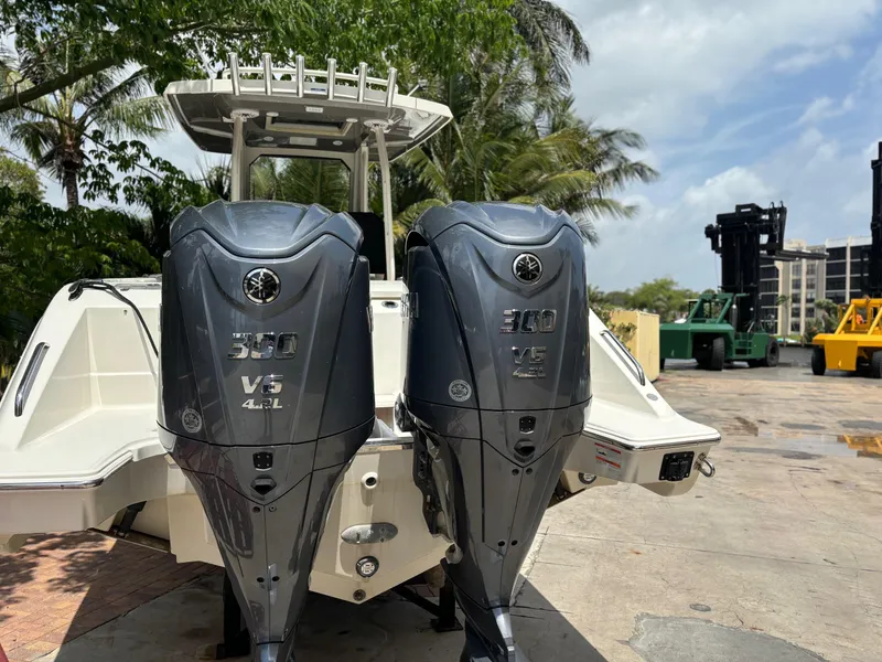 Slide: The Image of 2022 Pursuit S 288 boat with twin Yamaha 300 V6 outboard engines. - 8