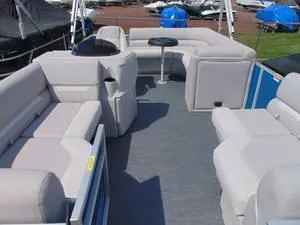Slide: The Image of 2024 Godfrey Xperience 1680 CX 25 in. Package pontoon boat interior with plush seating. - 13