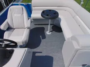 Slide: The Image of 2024 Godfrey Xperience 1680 CX 25 in. Package interior with seating and table. - 15