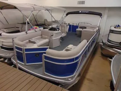 Slide: The Image of 2024 Godfrey Xperience 1680 CX 25 in. pontoon boat in showroom. - 22