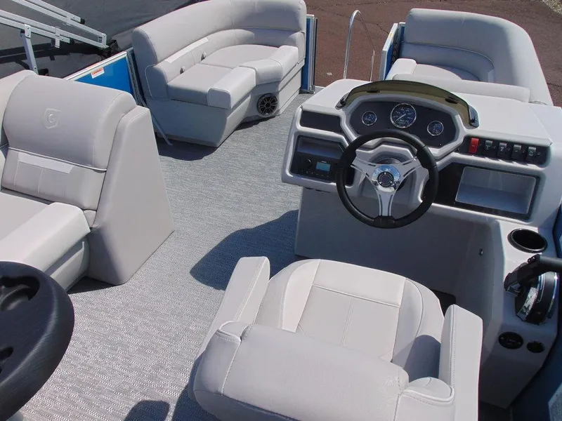 Slide: The Image of 2024 Godfrey Xperience 1680 CX 25 in. Package pontoon boat interior with helm and seating. - 8