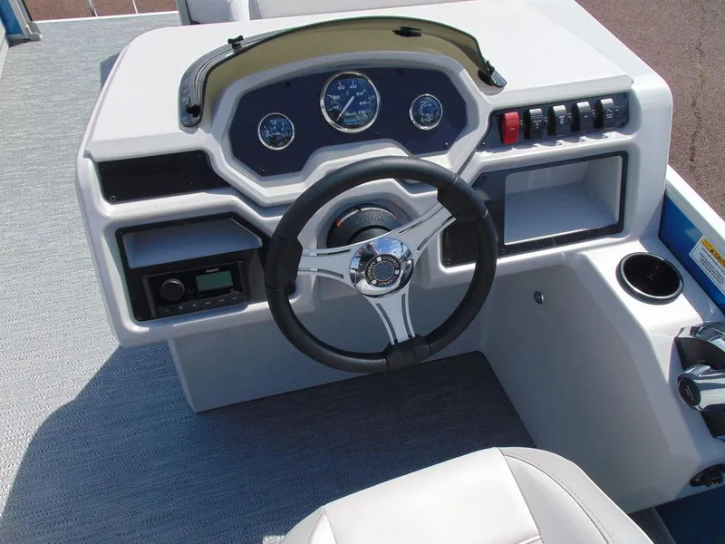 Slide: The Image of 2024 Godfrey Xperience 1680 CX 25 in. Package boat dashboard and steering wheel. - 9